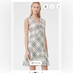 Black and White Sleeveless Wrap Dress with V-Neck for Work